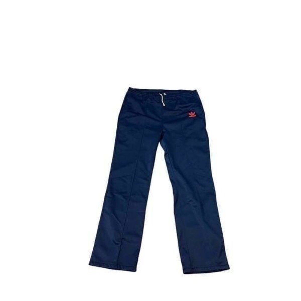 Adidas Blue Made in the USA VTG  Track Pants. The waste is 32 inches